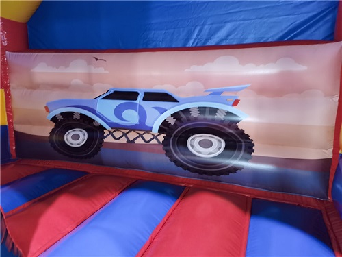 Springkussen 5x4 m - truck met glijbaan voor